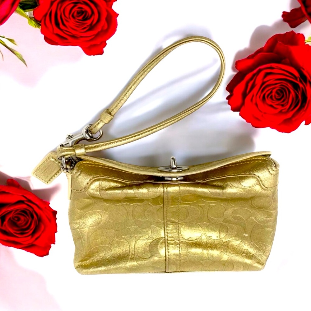 EUC COACH LEGACY METALIC GOLD LEATHER
SIGNATURE TURN LOCK WRISTLET